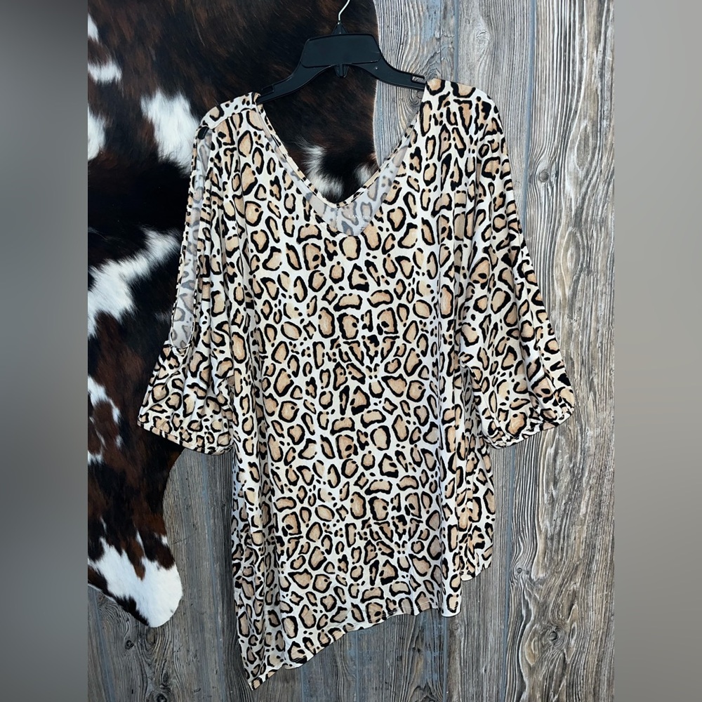 Lane Bryant size 22/24 cheetah print asymmetrical cut blouse